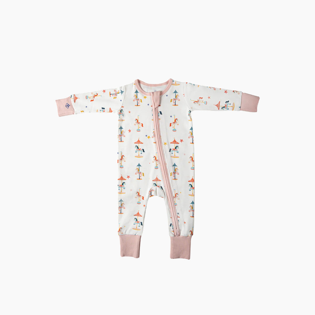 Snugbeenightwear cotton sleepsuit featuring a whimsical carousel