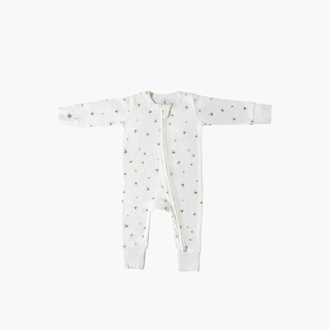 Snugbeenightwear organic cotton sleepsuit with cheerful bees, size 0–3M