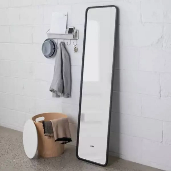 Umbra Hub Leaning full-length glass mirror with black rubber frame