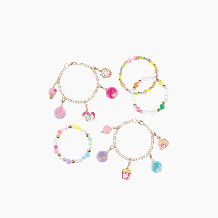 MAKE IT REAL Sweet Spin Carnival Lip Gloss Bracelets kit with strawberry scented lip gloss charms