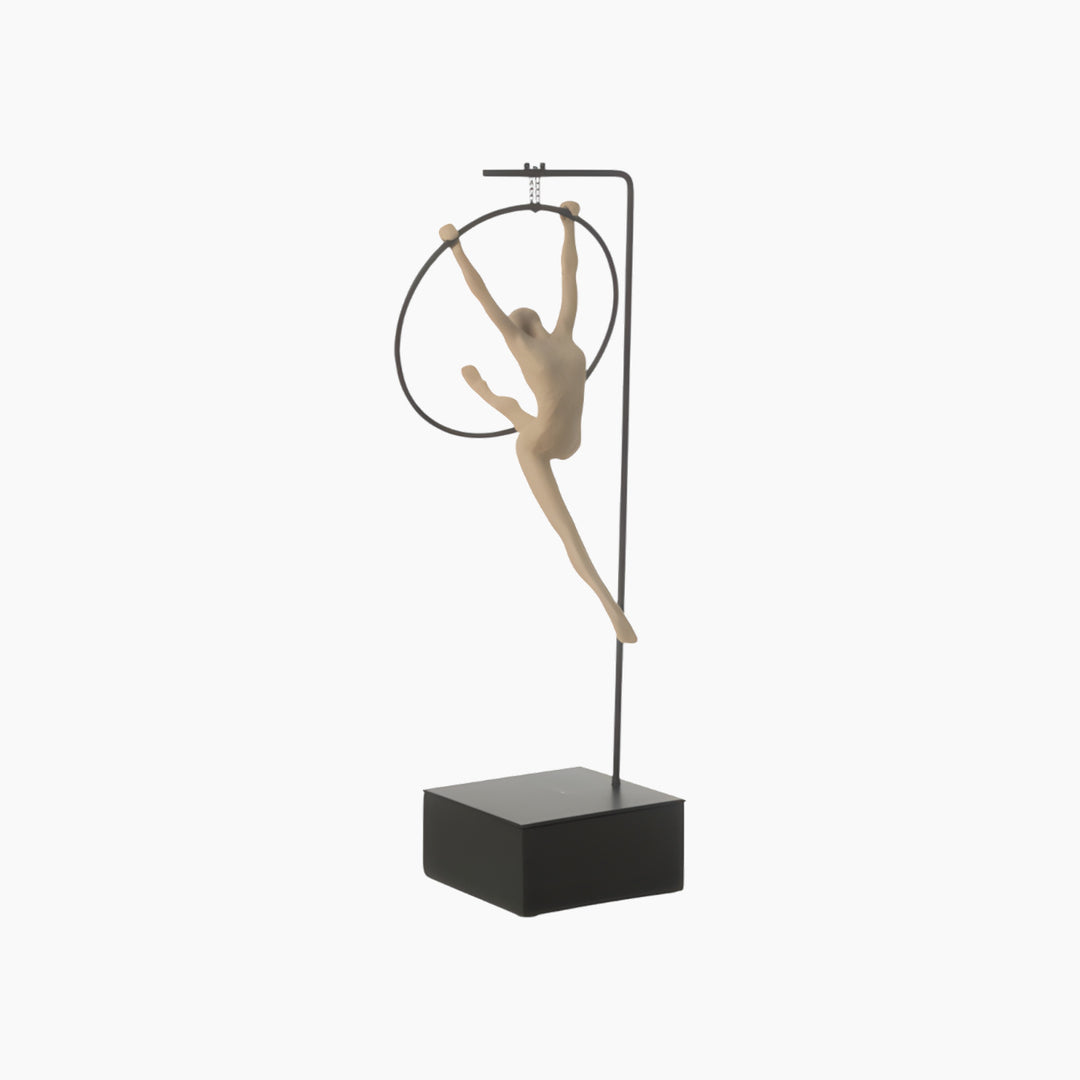 Resin gymnast hoop sculpture capturing dynamic movement