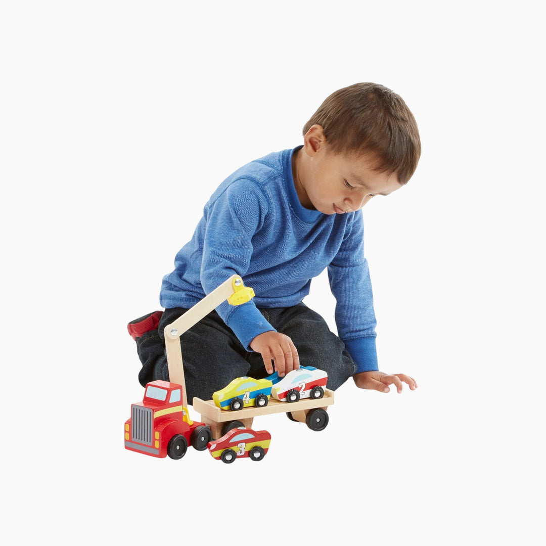 Wooden magnetic car loader with red truck and four colorful cars