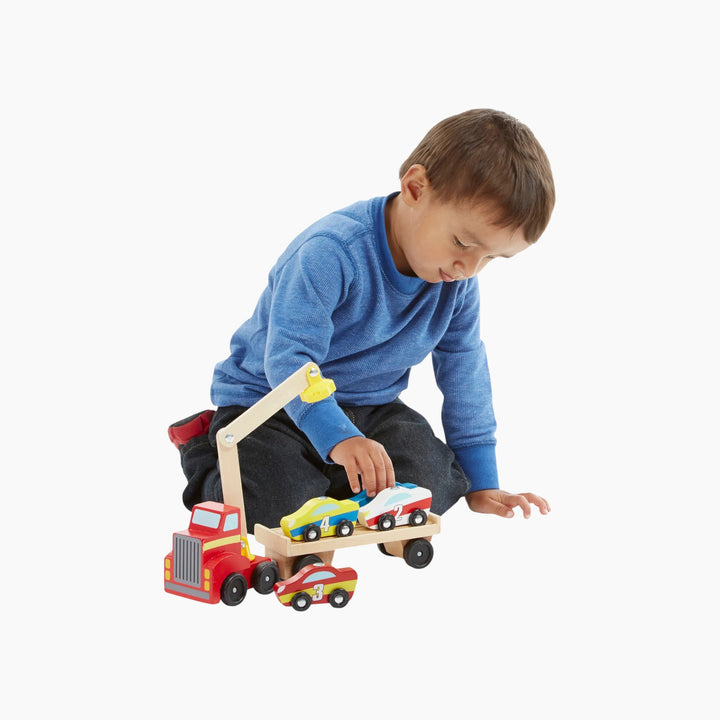 Wooden magnetic car loader with red truck and four colorful cars