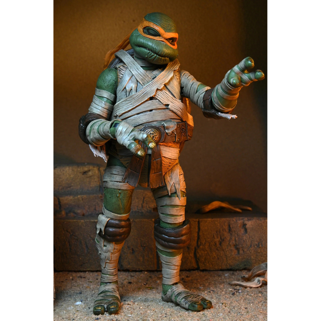 NECA Teenage Mutant Ninja Turtles x Universal Monsters Michelangelo as The Mummy Ultimate Action Figure