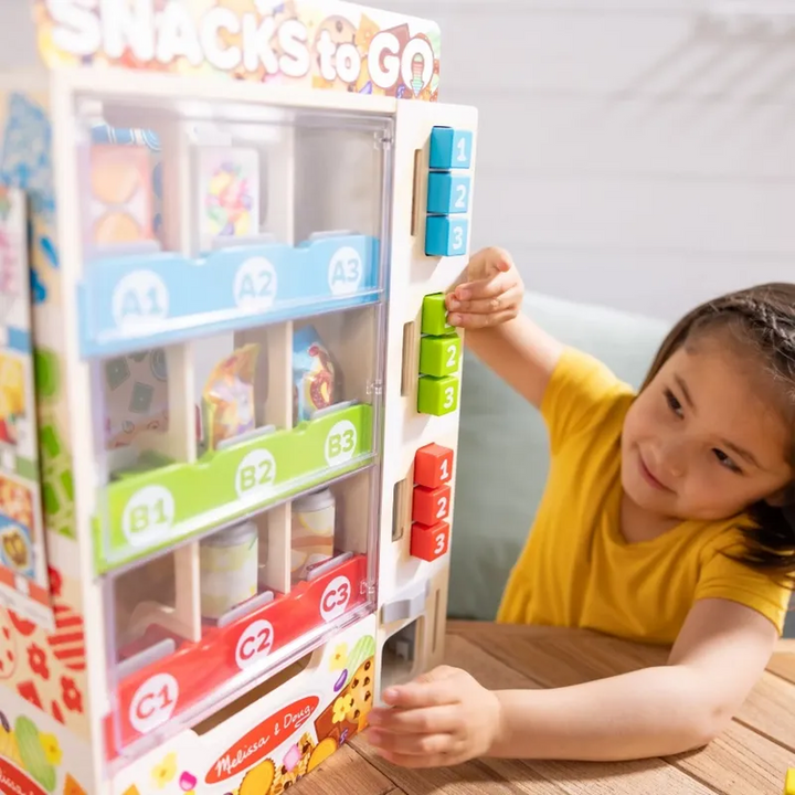 Melissa &amp; Doug wooden vending machine play set with nine double-sided play food packages