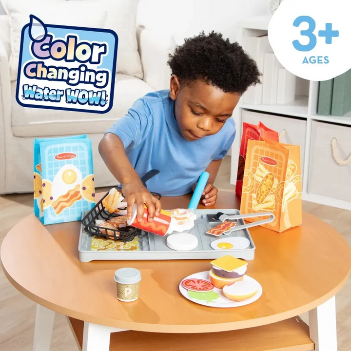 Melissa &amp; Doug Water Wow! Flip &amp; Fry Grill Play Set with color-changing food