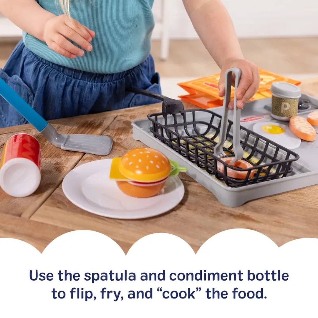 Melissa &amp; Doug Water Wow! Flip &amp; Fry Grill Play Set with color-changing food