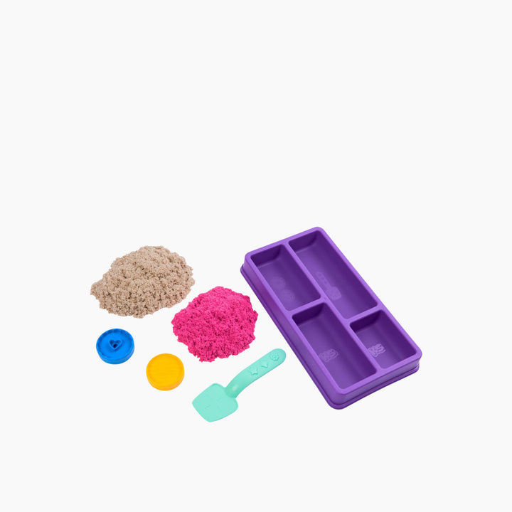 Spin Master Kinetic Sand cookie box toy with pink and brown sand