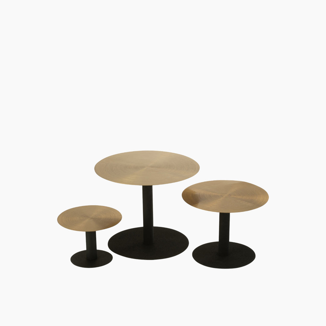 Set of three metal cake stands for displaying baked goods