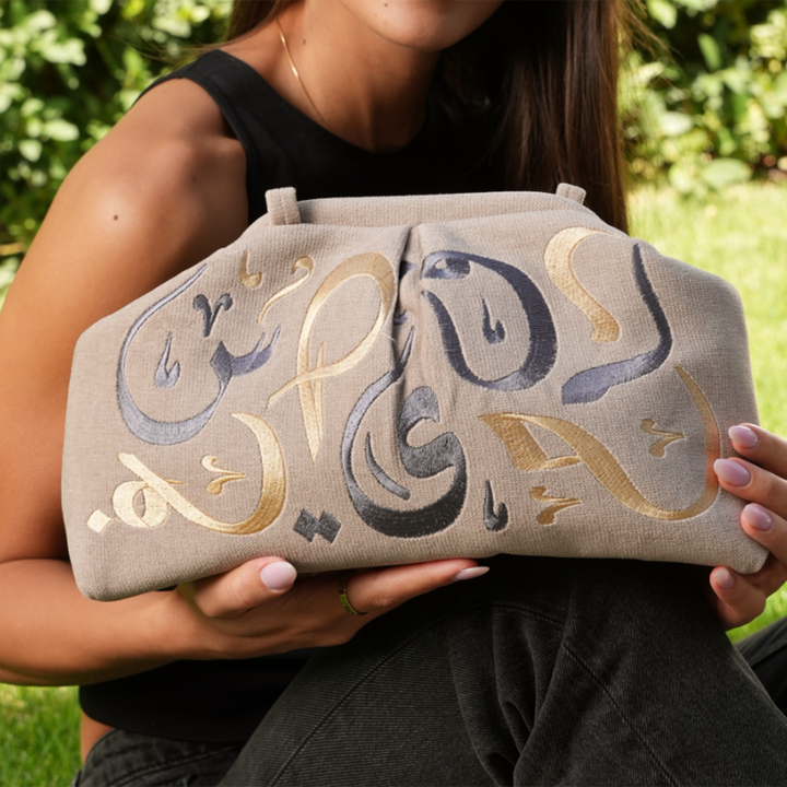 7orouf Clutch Bag
