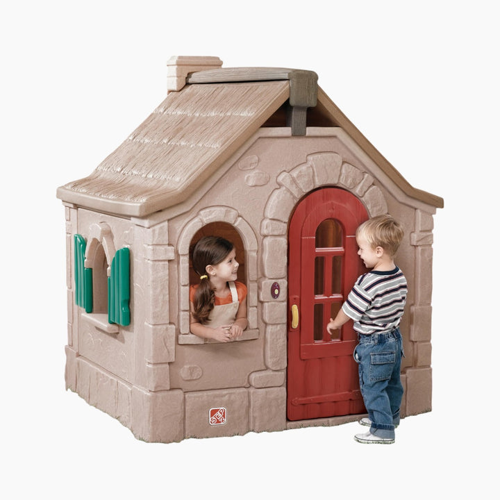 Step 2 Naturally Playful Storybook Cottage kids playhouse with working doorbell