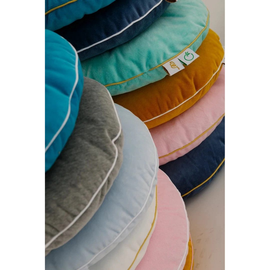 Wigiwama baby pink button cushion with contrasting button detail