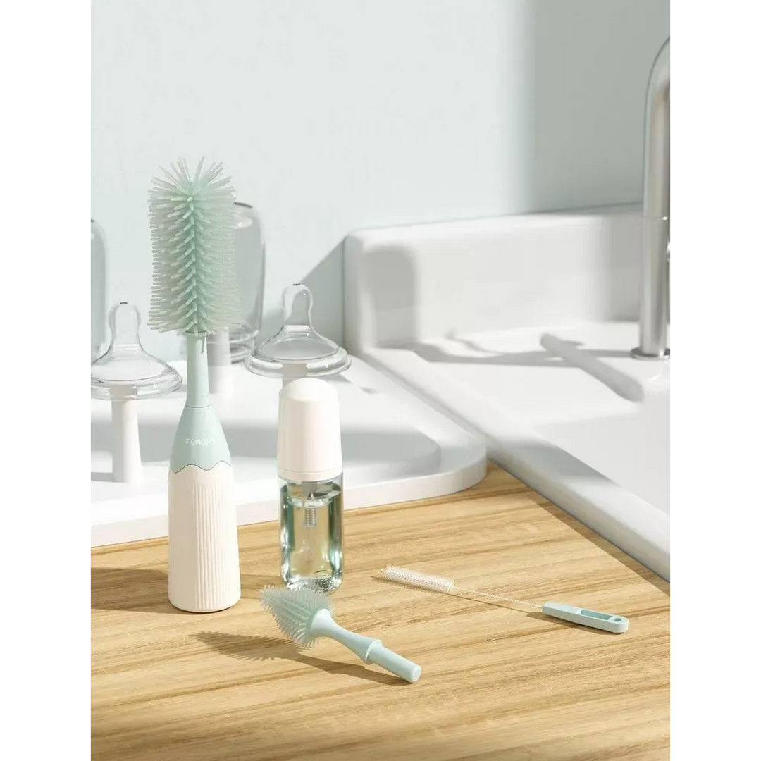 Momcozy bottle brush kit with innovative push-press design and silicone bristles