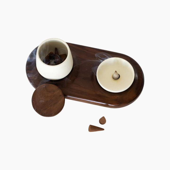Joyce Spasioti Designs incense cones set with walnut base and ceramic storage piece.