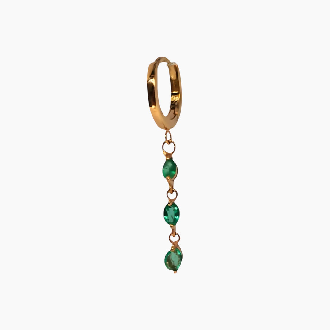 Rose gold hoop earrings with three emeralds