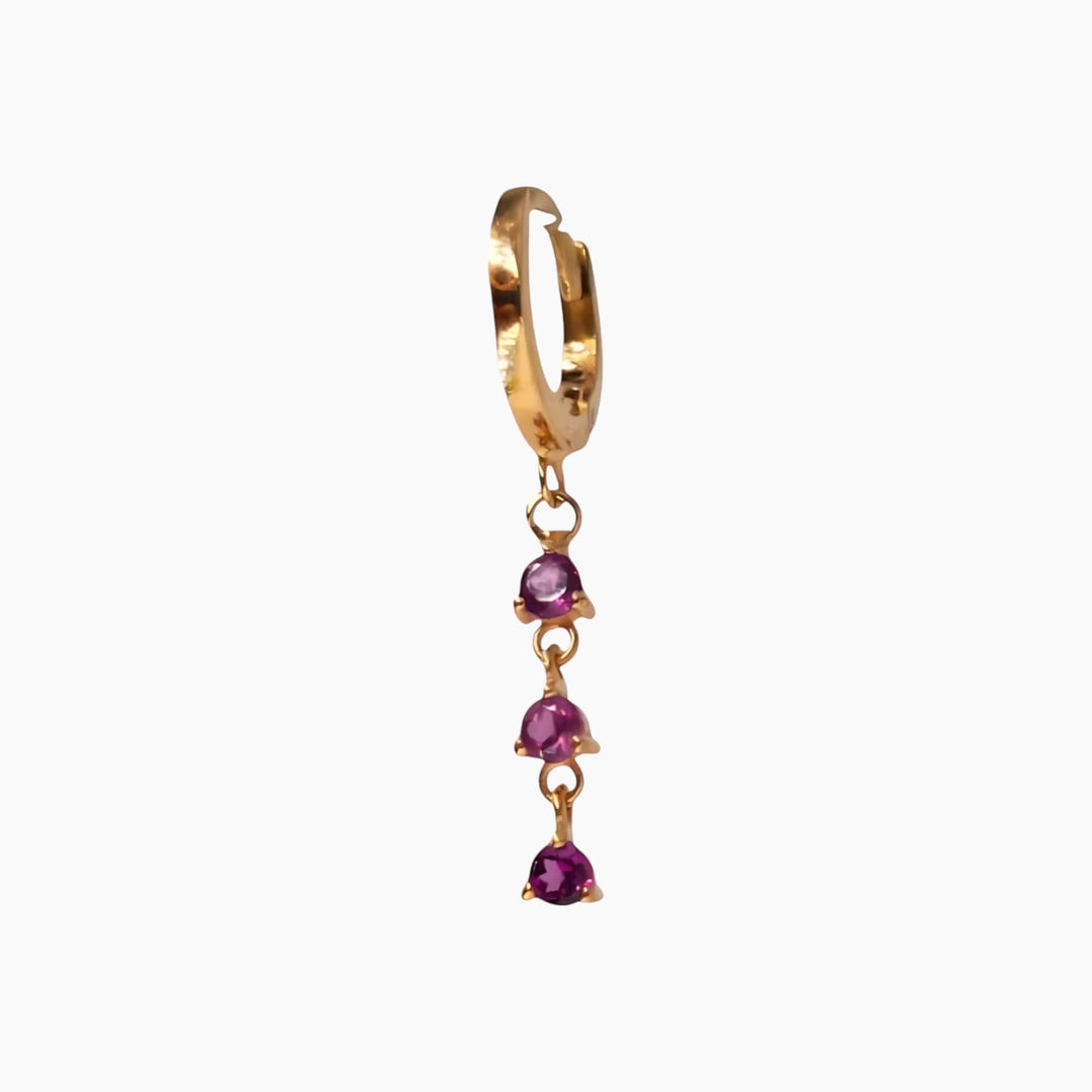 Yellow gold hoop earrings with three pink sapphires