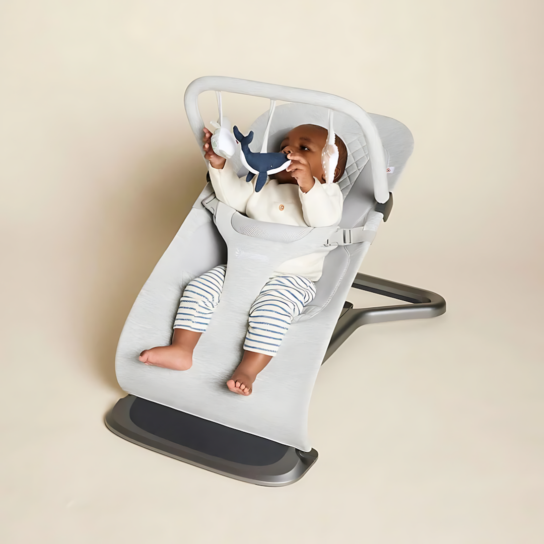 Ergobaby Evolve Bouncer Toy Bar in light grey with plush ocean animals