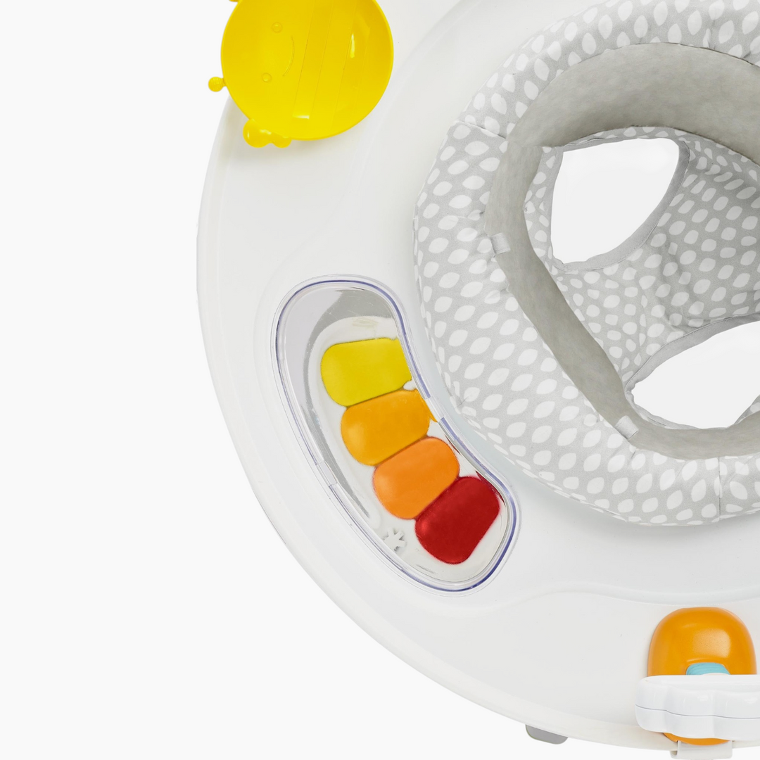 Skip Hop 3 stage activity center with rotating seat and discovery window