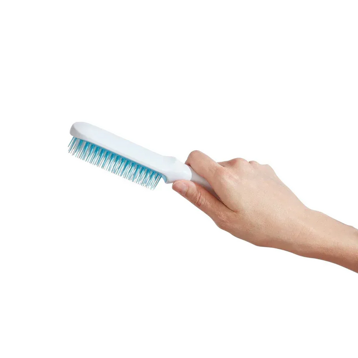 FridaBaby Fine Or Straight Hair Detangler with soft, flexible bristles