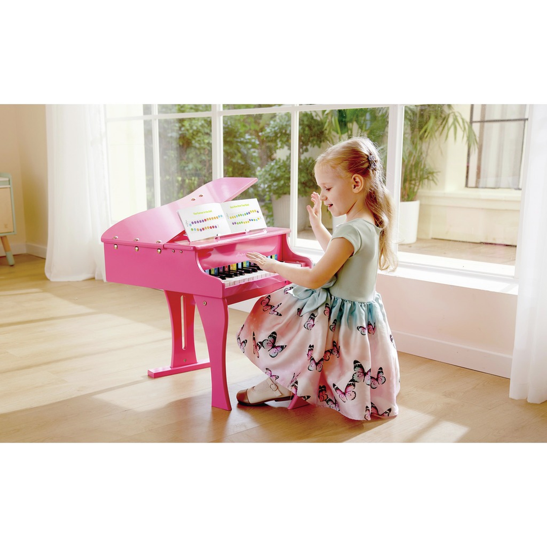 HapeHappyGrandPiano_PinkElegantWoodenToyPianoforEarlyMusicalExploration6943478008885_8_framed - HUNA