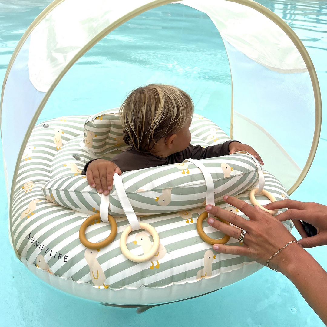 SunnyLife interactive baby float with adjustable seat and canopy