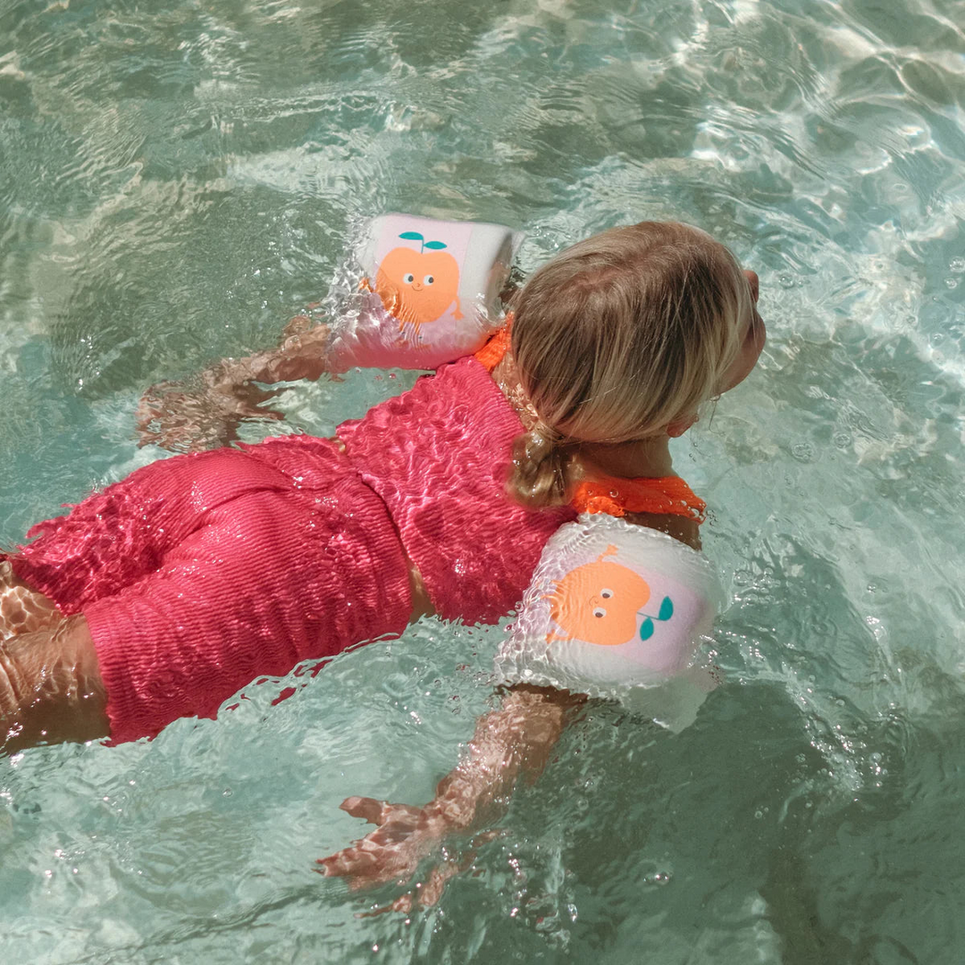 SunnyLife Kids Neoprene Arm Floaties in Poppy the Peach Pink Stripe