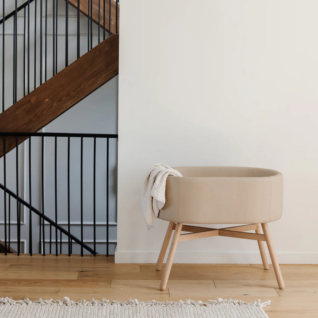 Babyletto x GATHRE Millet capsule bassinet with rounded rubberwood legs