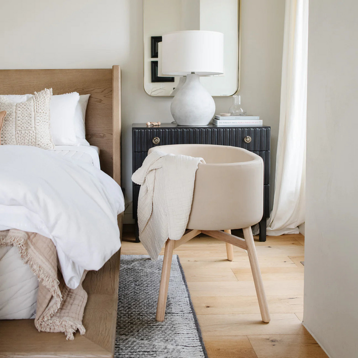 Babyletto x GATHRE capsule bassinet in Millet color