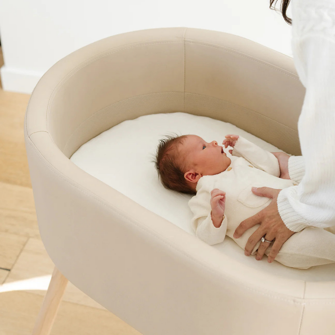 Babyletto x GATHRE capsule bassinet in Millet color