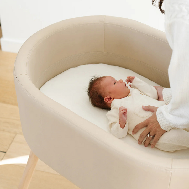 Babyletto x GATHRE capsule bassinet in Millet color