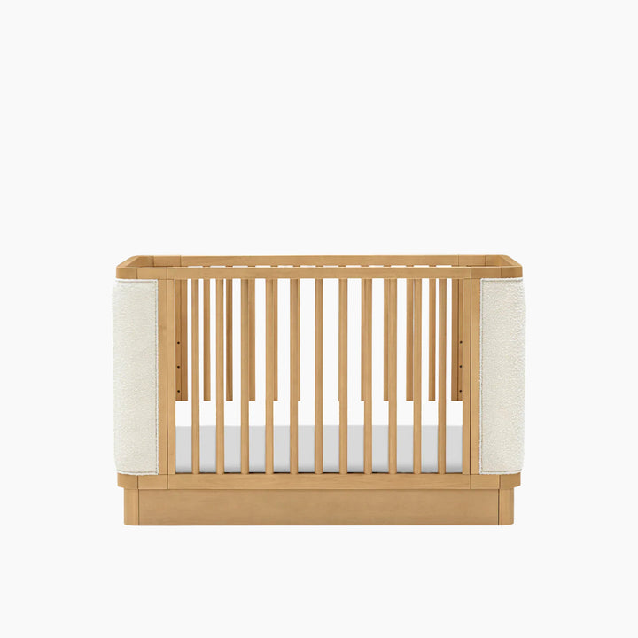 Babyletto Bondi Boucle 4-in-1 convertible crib with warm wood tone