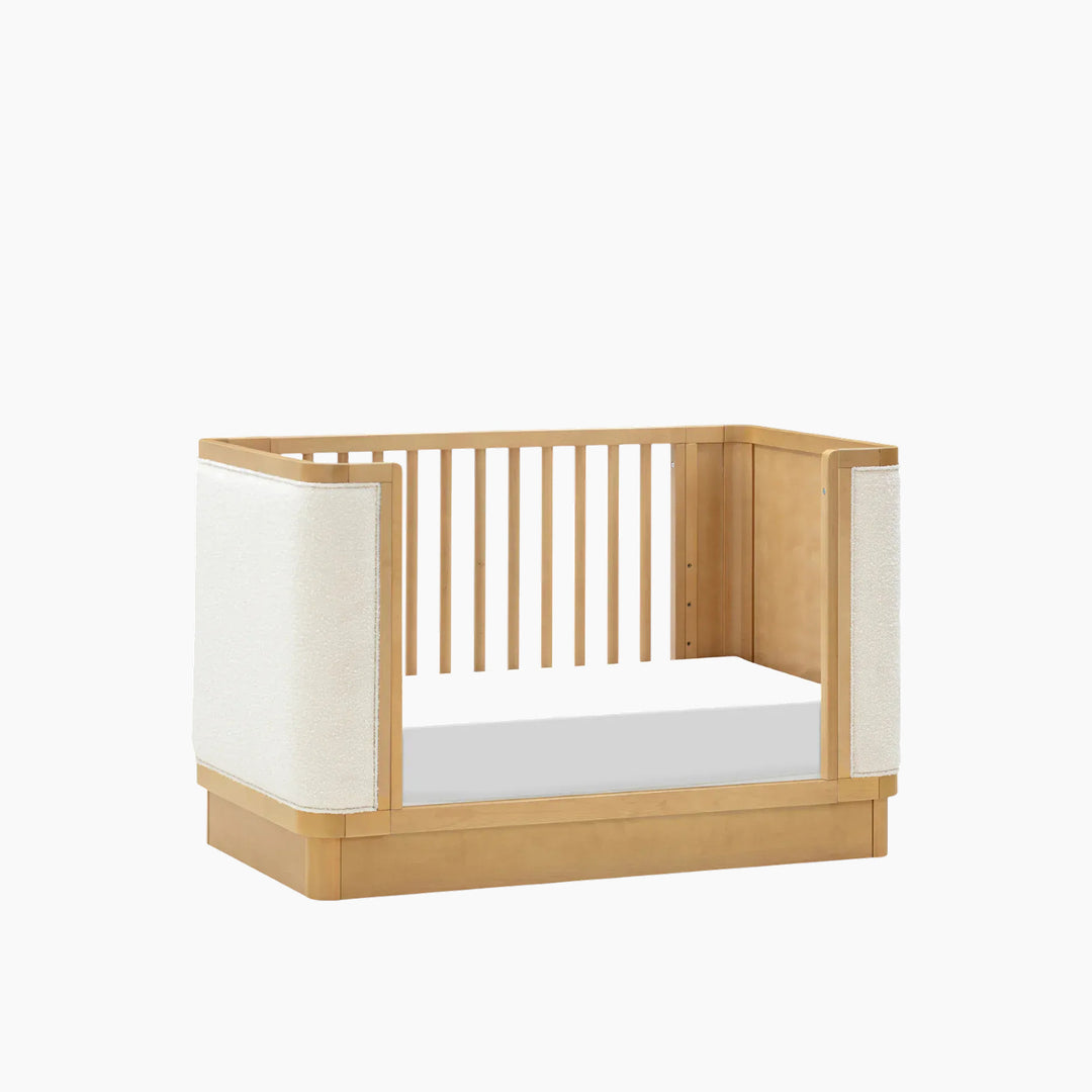 Babyletto Bondi Boucle 4-in-1 convertible crib with warm wood tone