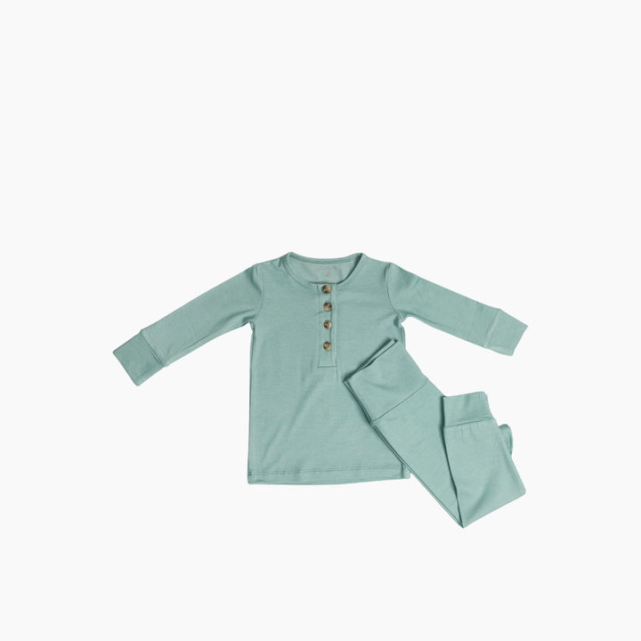 Luna Sage Pyjama Set in size 0-3 months with footies and fold-over cuffs