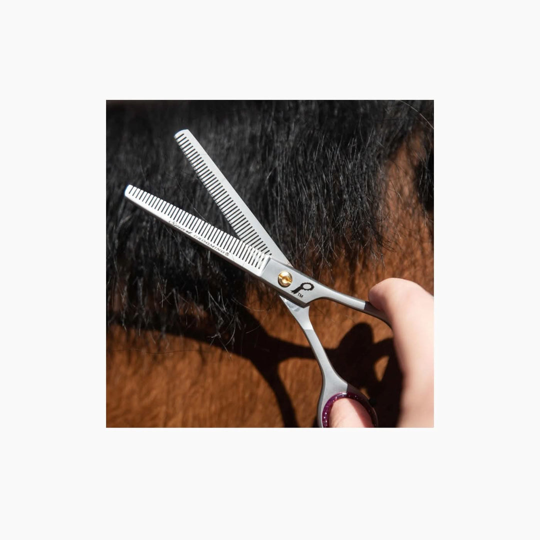 Stainless steel thinning shears with one straight and one serrated blade