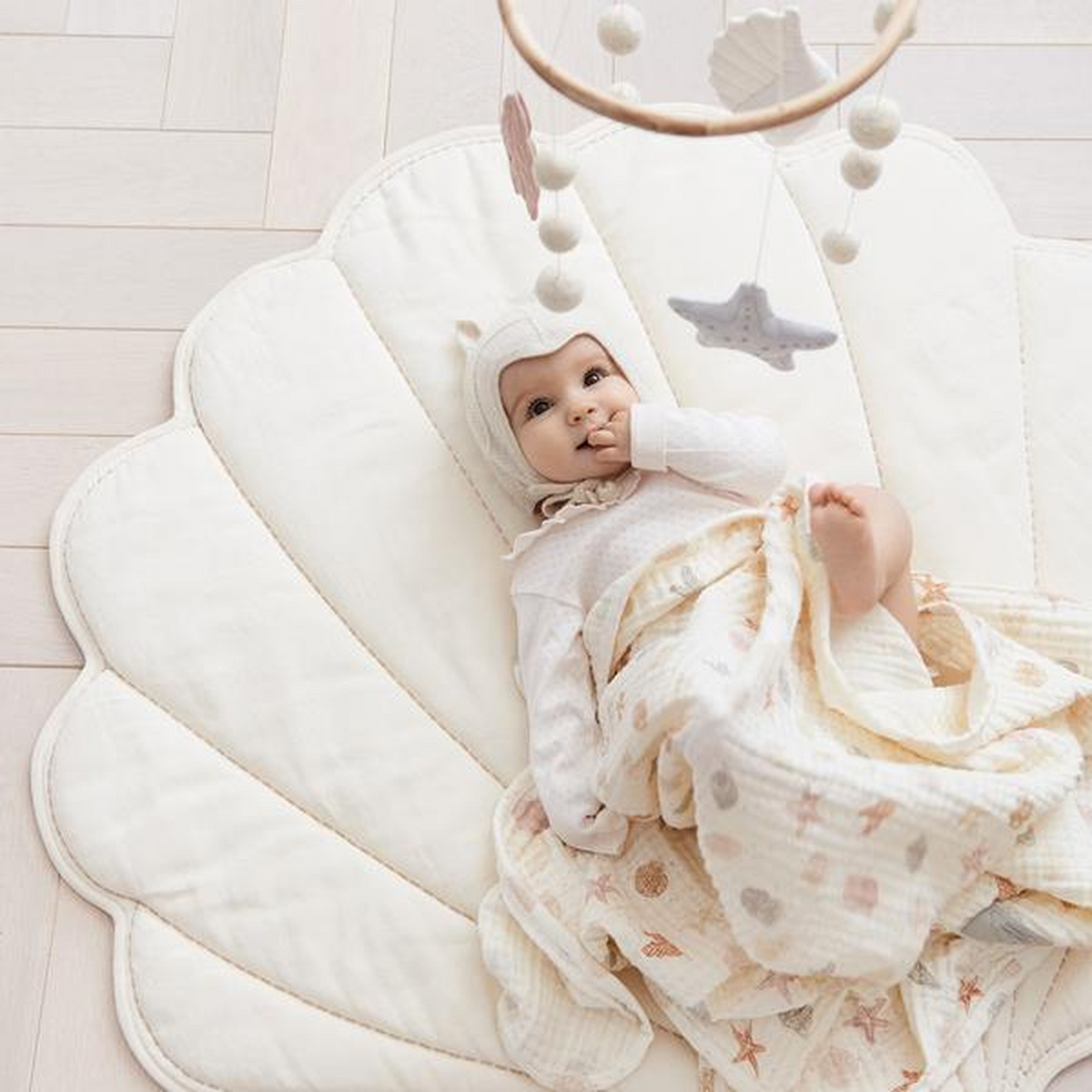 Cam Cam Copenhagen Sea Shell playmat in dusty rose