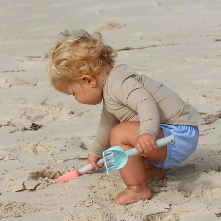 SunnyLife silicone sand spade and rake set in Apple Sorbet