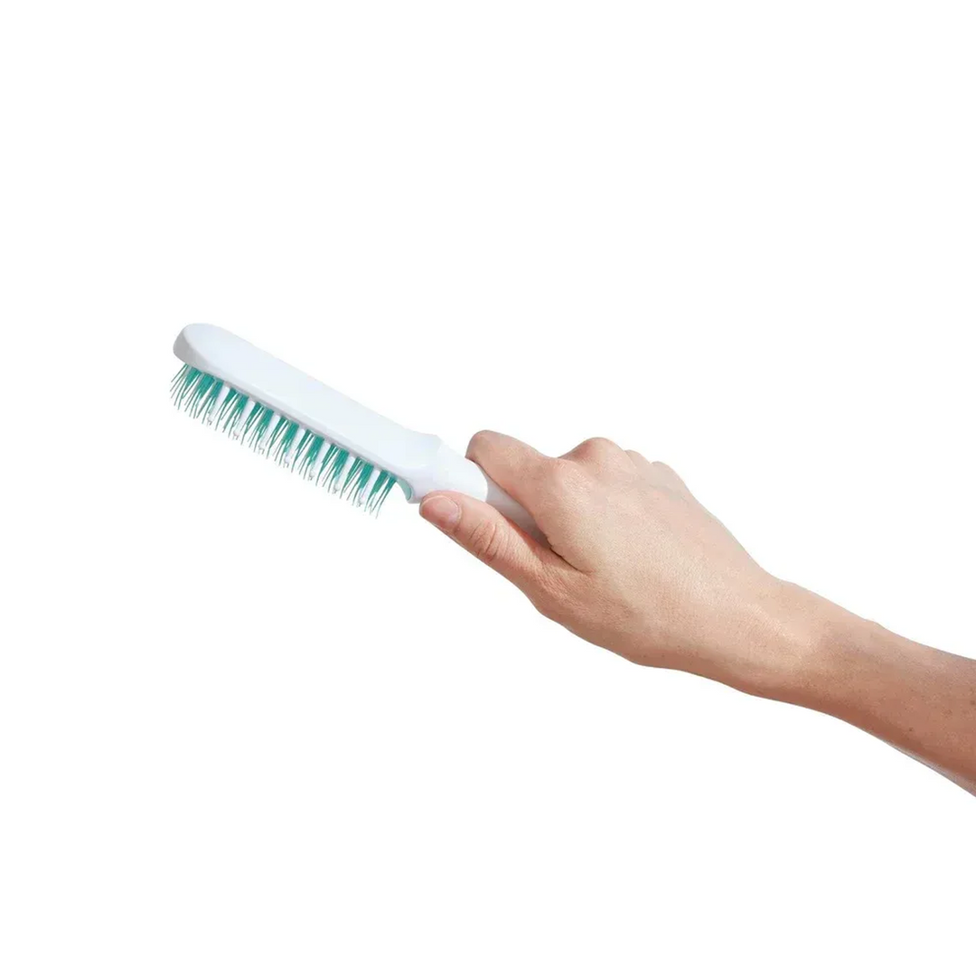 FridaBaby Thick Or Curly Hair Detangler with wide-tooth comb and bristles