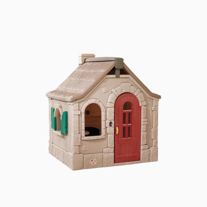 Step 2 Naturally Playful Storybook Cottage kids playhouse with working doorbell