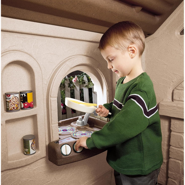 Step 2 Naturally Playful Storybook Cottage kids playhouse with working doorbell